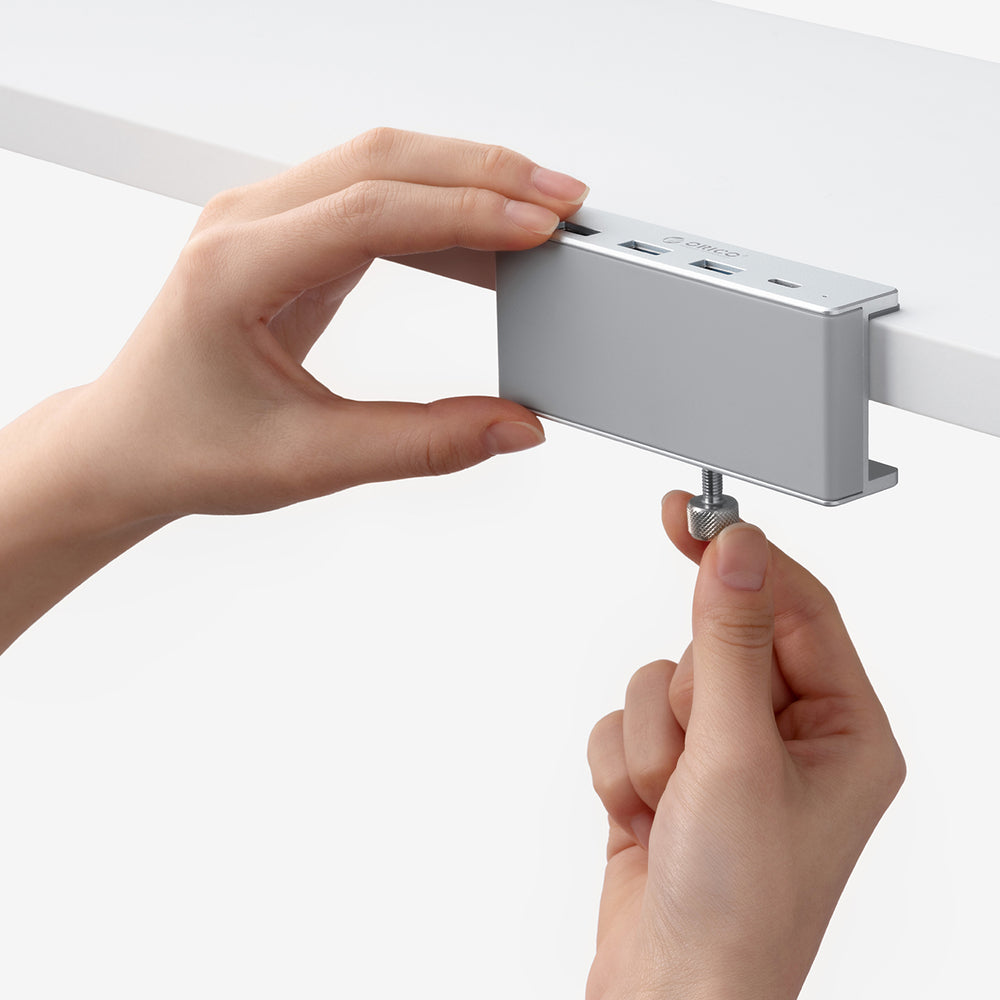 Orico MH4PC Hub Clamp-monteret USB-C / 3x USB-A 3.0 + 1x USB-C 3.0 - Sølv