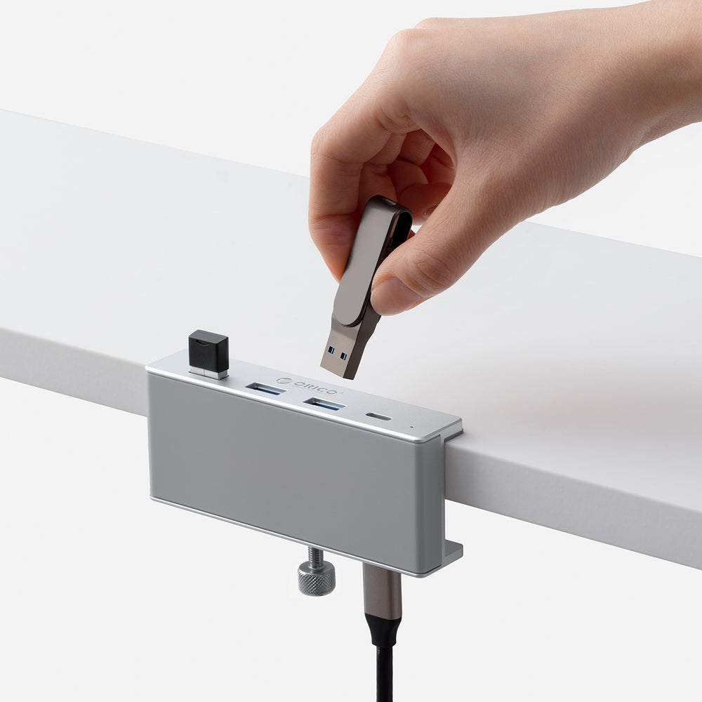 Orico MH4PC Hub Clamp-monteret USB-C / 3x USB-A 3.0 + 1x USB-C 3.0 - Sølv