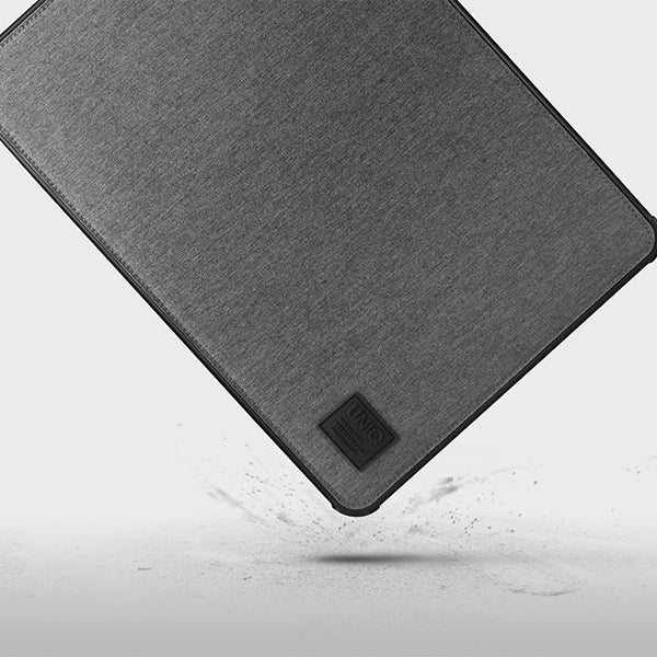 Uniq Dfender cover til en 16" laptop - grå