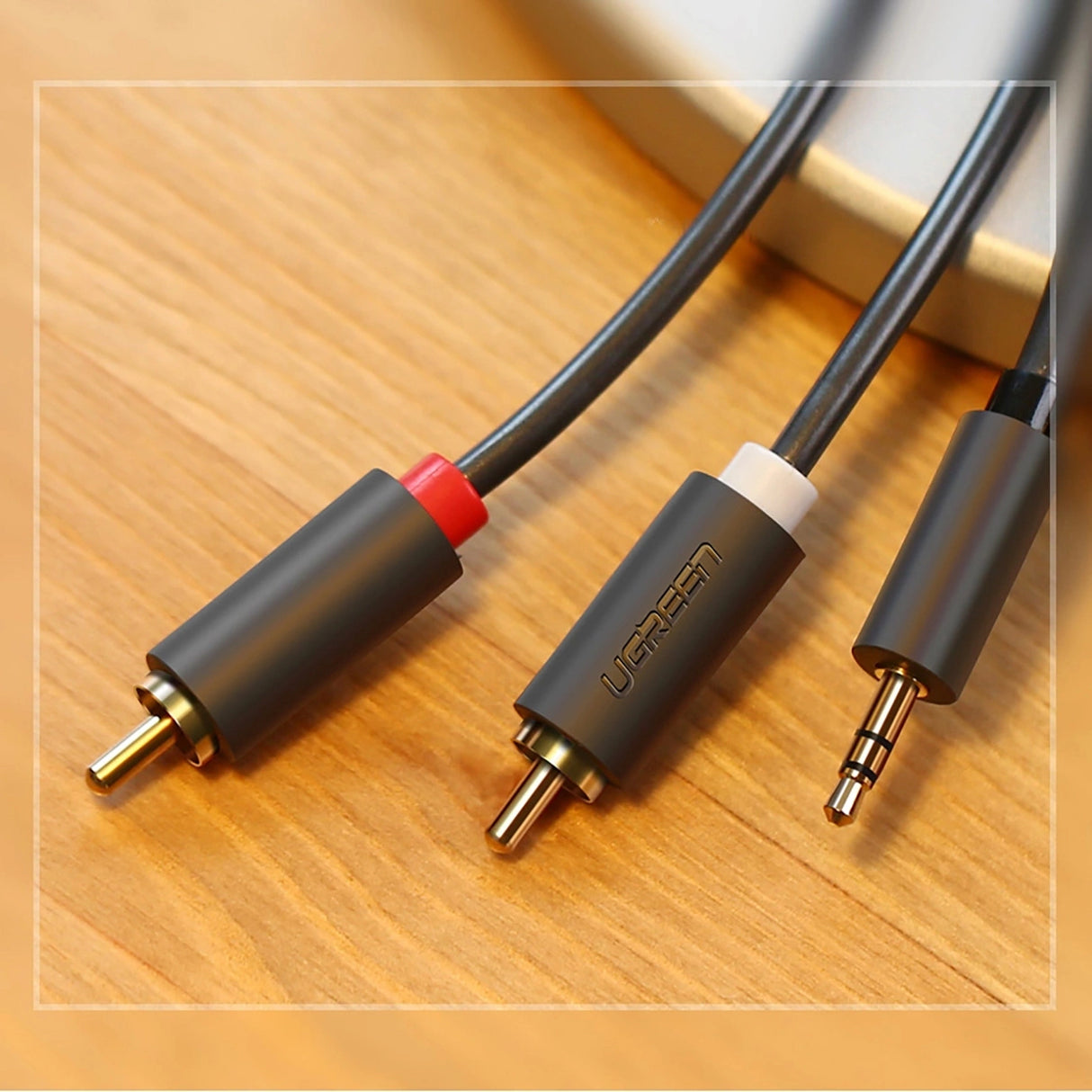 Ugreen AV102 10512 kabel 3,5 mm mini jack (mand) / 2RCA (mand) 3m - grå