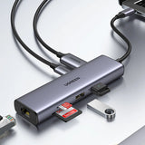 Ugreen CM512 90568 USB-C Adapter - 2x USB-A 3.0 / HDMI / RJ45 / SD og TF Card Reader / USB-C PD 100W - Grå