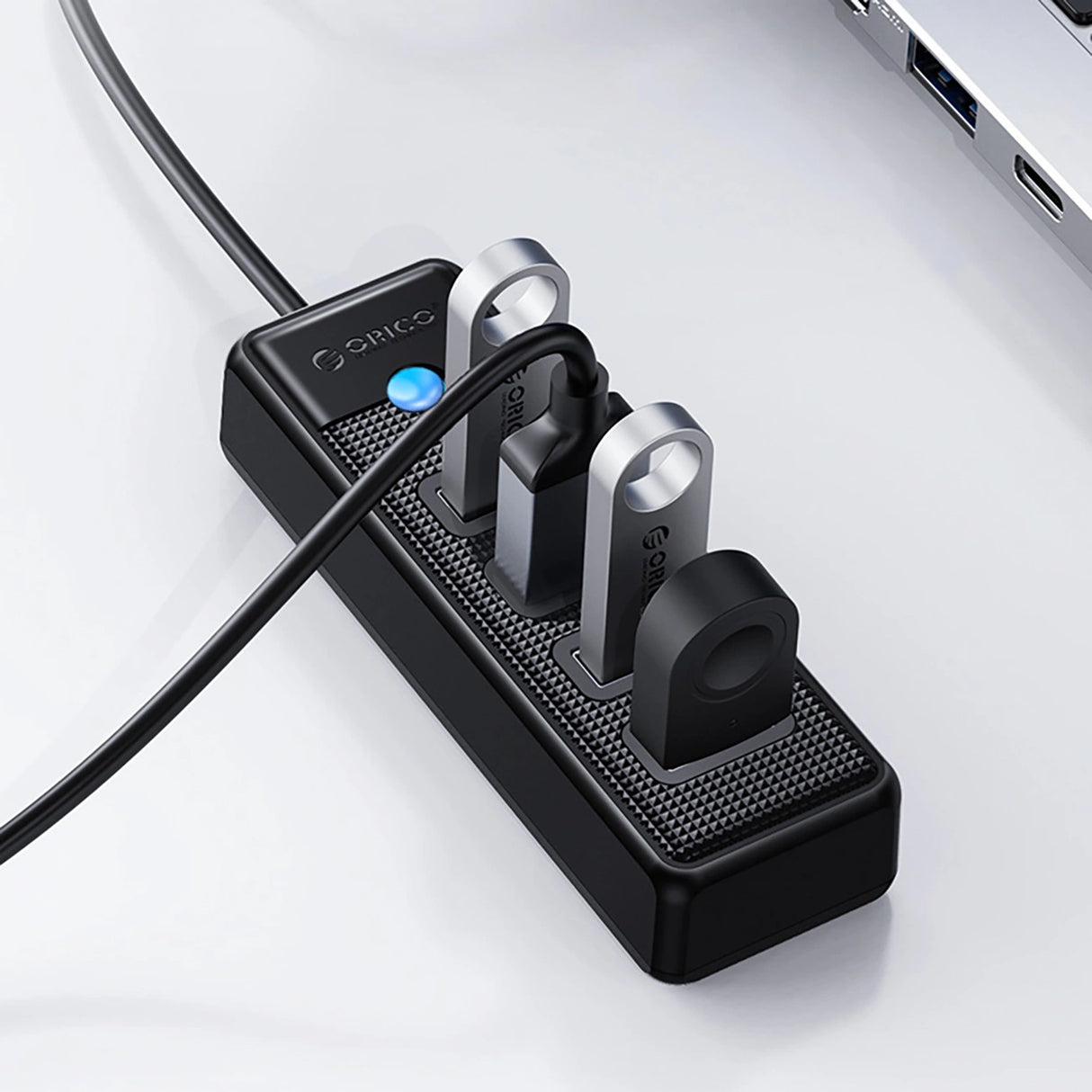 Hub Orico PW4U-U3 USB-A / 4x USB-A 3.0 - sort