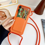 Silikonfoder med kortlås og rem til iPhone 18 Pro Max / 17 Pro Max - orange
