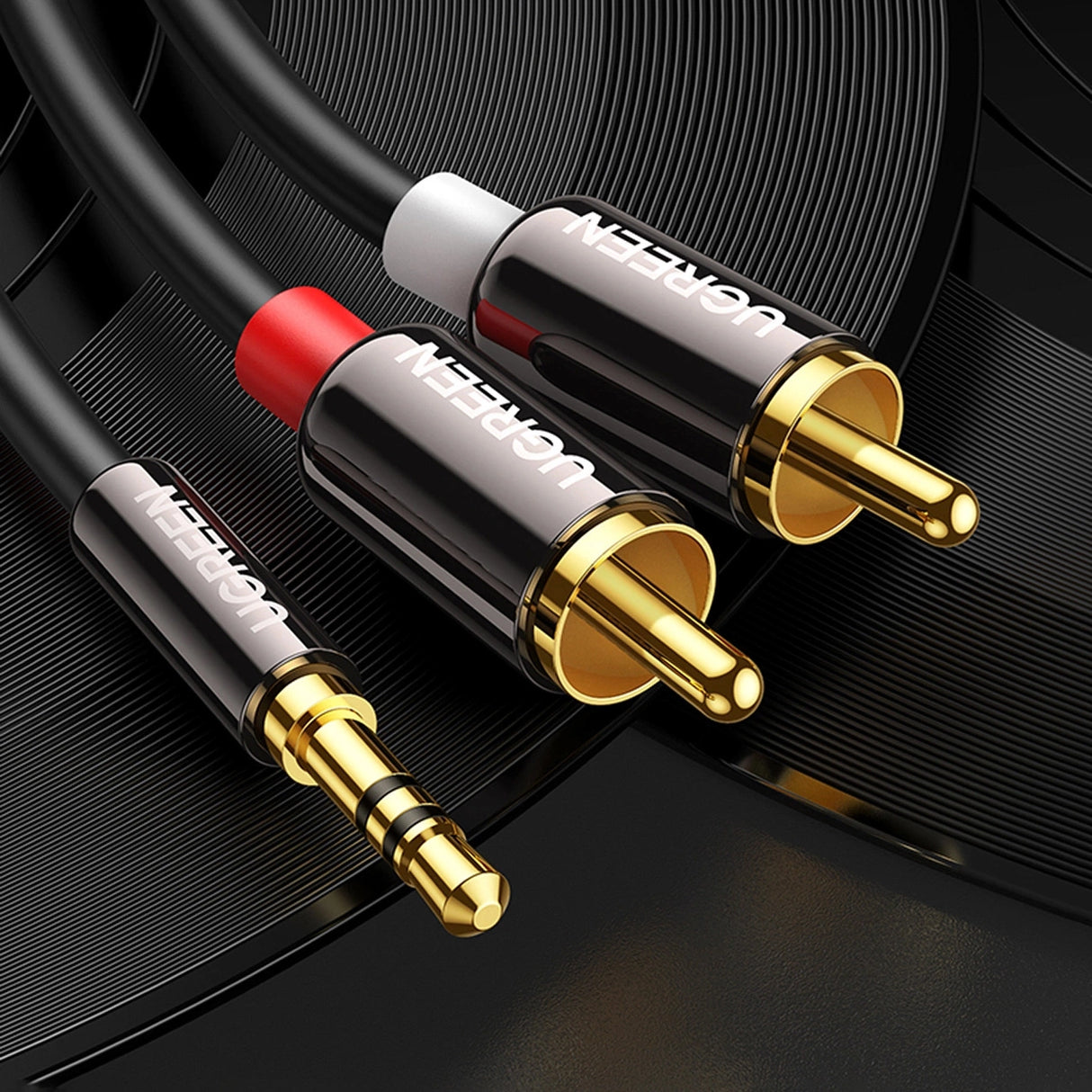 Ugreen AV116 10584 audio mini jack kabel 3,5 mm (mand) / 2RCA (mand) 2m - sort