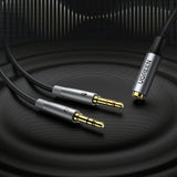 Ugreen AUX splitterkablet 3,5 mm mini jack (kvinde) - 2x 3,5 mm mini jack (mand - mikrofon og hovedtelefoner) sølv (AV193 50255)
