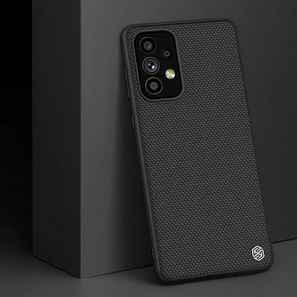 Nillkin Textured Case holdbar forstærket etui med gel ramme og nylon tilbage til Samsung Galaxy A73 sort