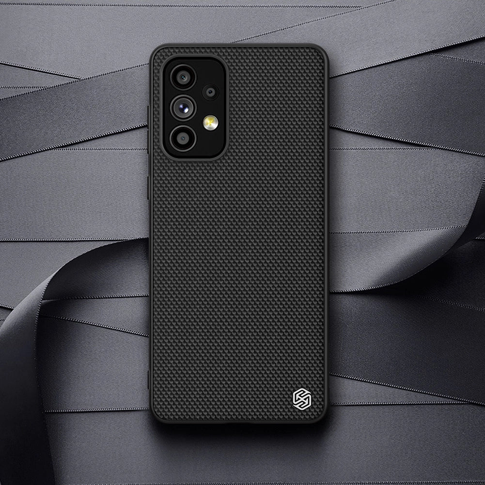 Nillkin Textured Case holdbar forstærket etui med gel ramme og nylon tilbage til Samsung Galaxy A73 sort