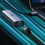 Ugreen multifunktionsadapter HUB USB 3.0 - 3 x USB / Ethernet RJ-45 / USB Type C PD grå (CM475)