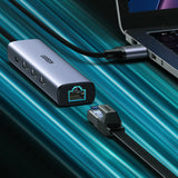 Ugreen multifunktionsadapter HUB USB 3.0 - 3 x USB / Ethernet RJ-45 / USB Type C PD grå (CM475)